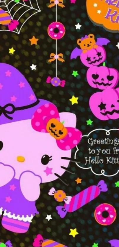 Hello Kitty in a witch costume with Halloween decorations.