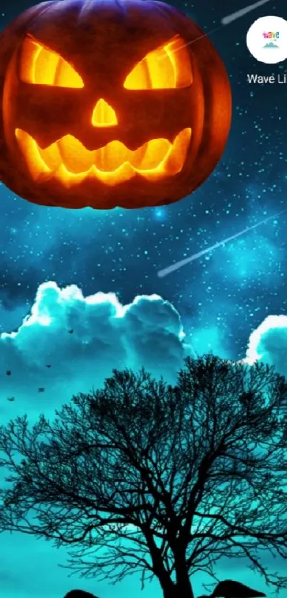 Mobile wallpaper of glowing pumpkin under starry sky with silhouetted tree.