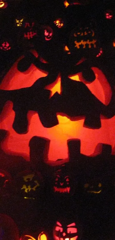 Glowing carved pumpkins in Halloween design for mobile wallpaper.