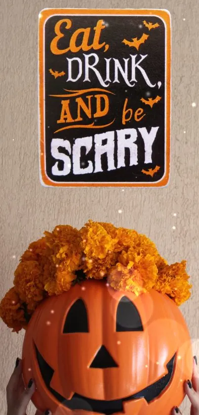 Halloween pumpkin with marigolds and spooky sign mobile wallpaper.