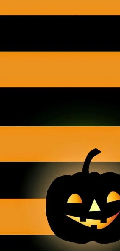 Halloween wallpaper with pumpkin and orange-black stripes.