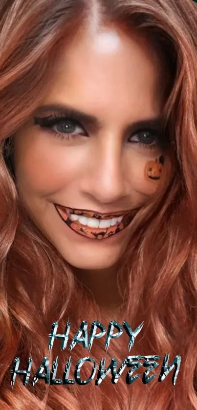 Red-haired witch with pumpkin makeup smiles in Halloween-themed wallpaper.