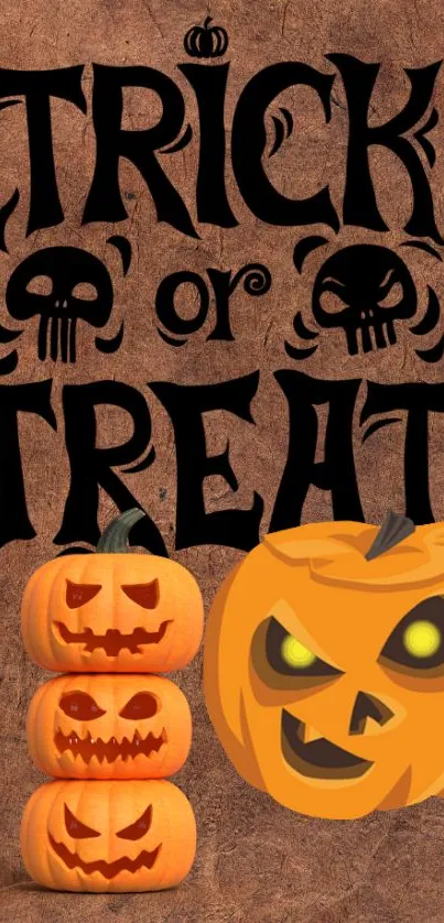 Spooky Halloween wallpaper with pumpkins and 'Trick or Treat' text.