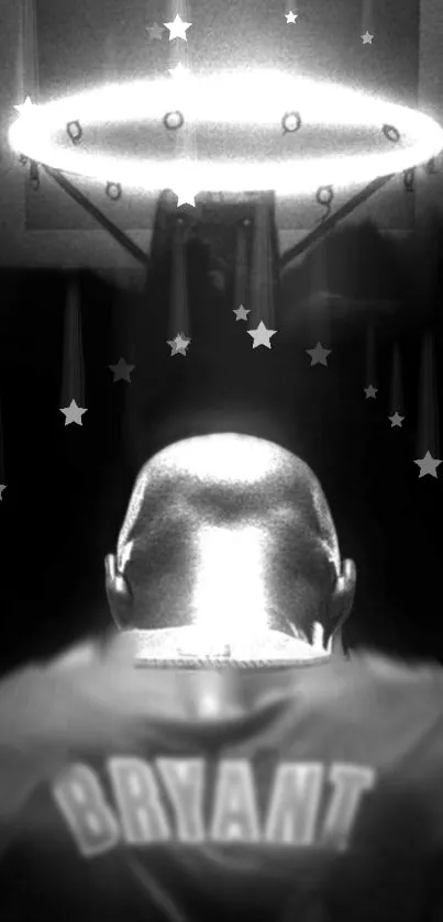 Silhouette of a basketball player with a glowing halo and starry background.