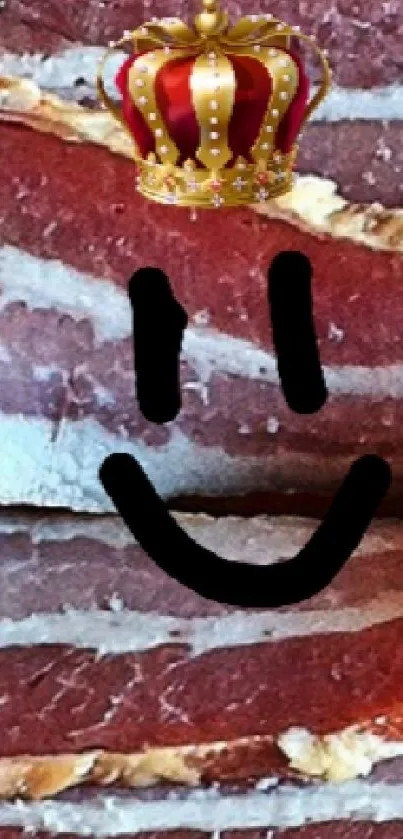 Bacon slices with a smiling face and crown on wooden background.