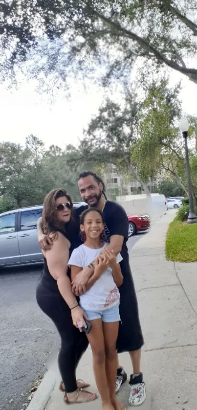 Family enjoying a peaceful outdoor stroll with greenery.