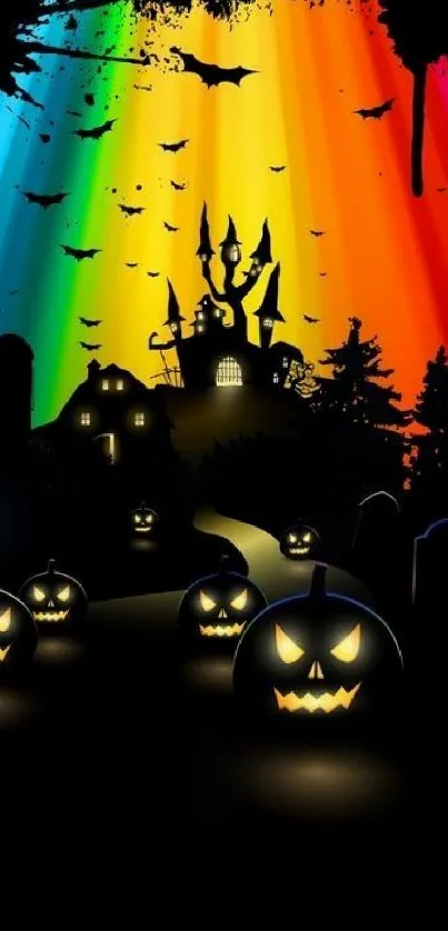 Halloween wallpaper with pumpkins and haunted house in rainbow sky.