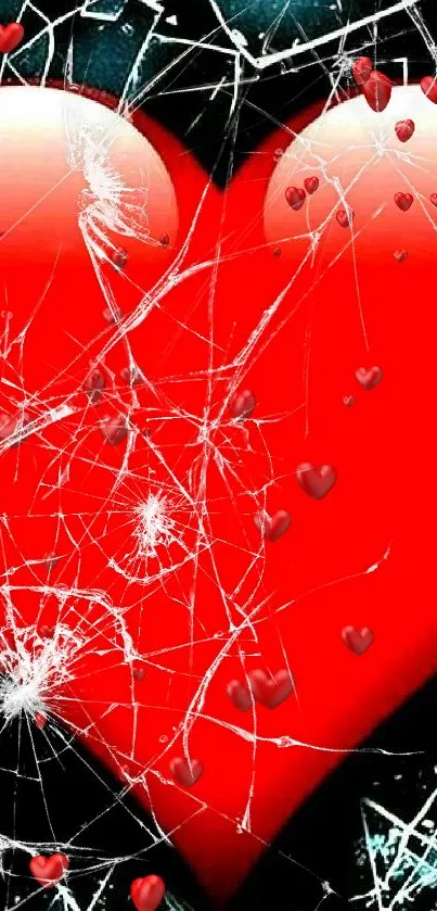 Red heart with shattered glass on a dark background.