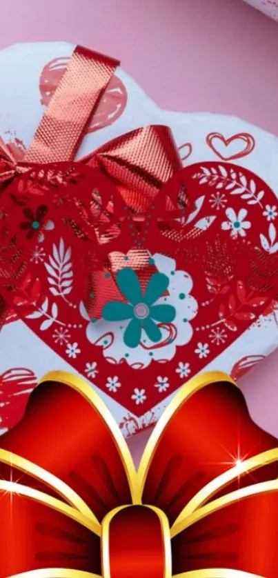 Heart-shaped gift with red ribbon on pink background.