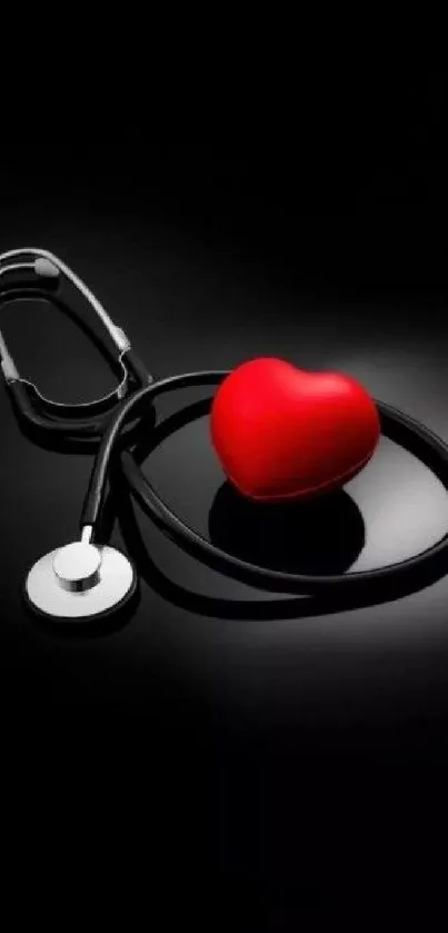 Red heart and stethoscope on dark background wallpaper.