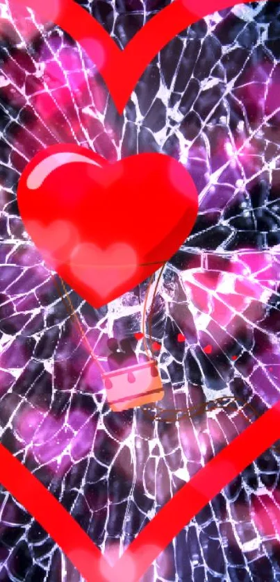 Red heart balloon on cracked glass wallpaper.