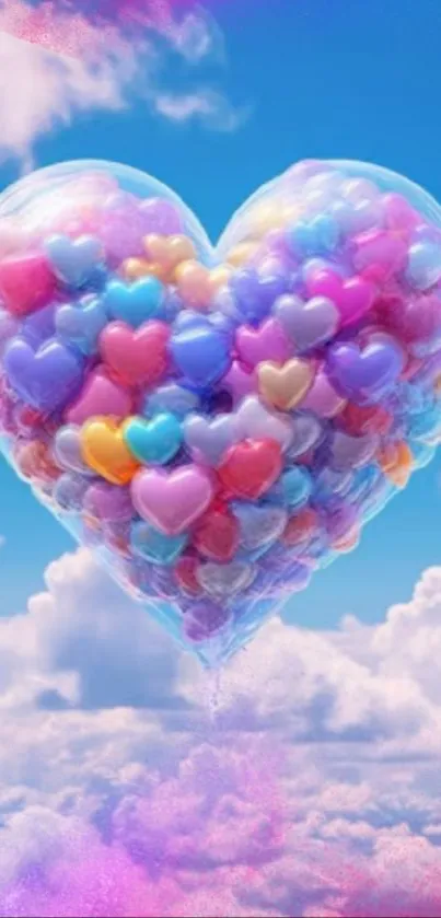 Heart-shaped balloon made of colorful balloons in a blue sky with clouds.