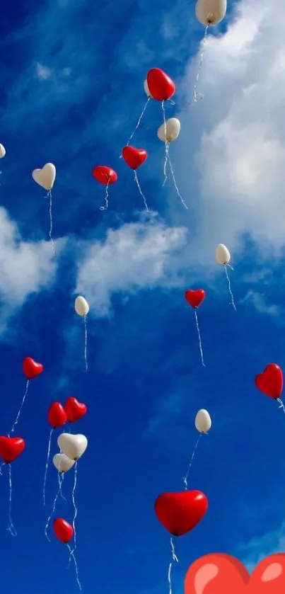 Heart balloons floating in azure blue sky.