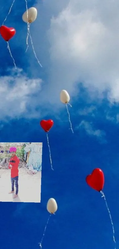 Red and white heart balloons float in a bright blue sky with fluffy clouds.