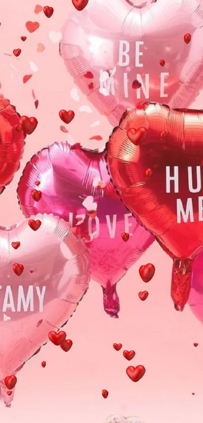 Heart-shaped balloons with love messages on a pink background.