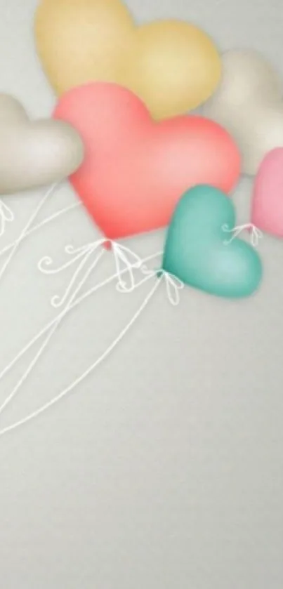 Heart-shaped balloons on a light gray background.