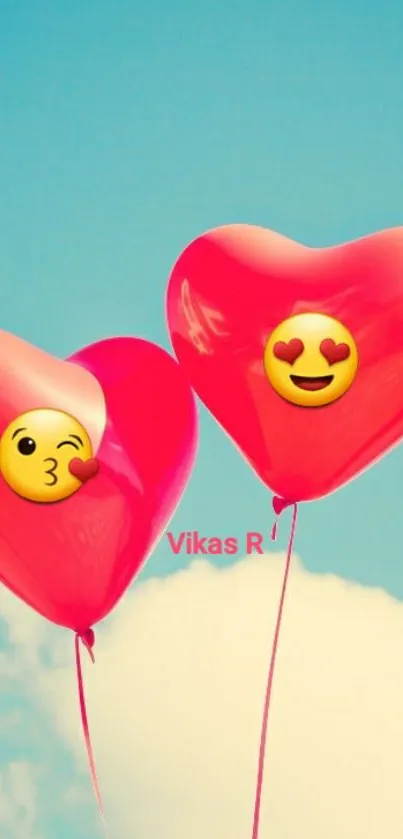 Heart-shaped balloons with emojis against a blue sky.