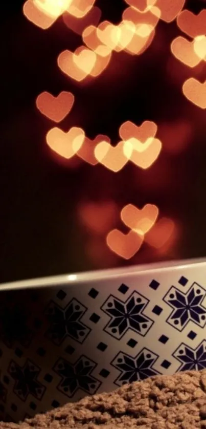 Patterned cup and heart-shaped bokeh in warm tones.