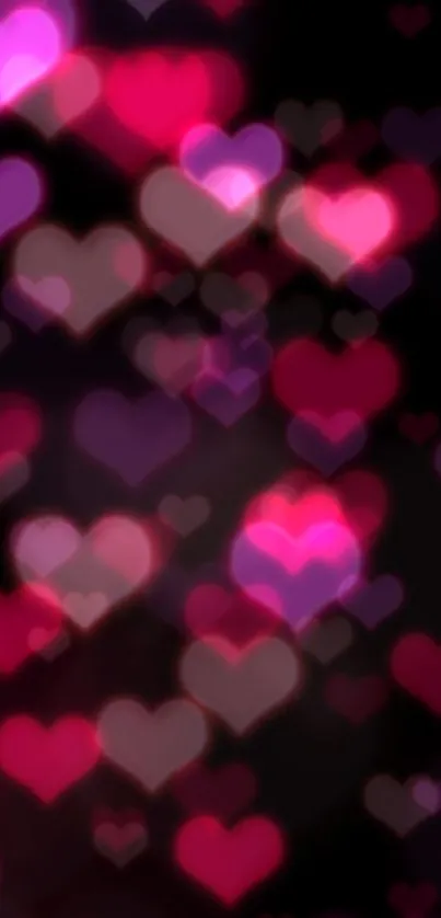 Heart bokeh wallpaper with pink and purple hues.