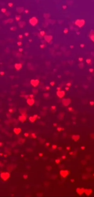 Red heart bokeh effect wallpaper with deep hues.