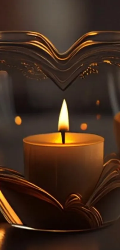 Heart-shaped candle glowing warmly inside a glass holder on a dark background.