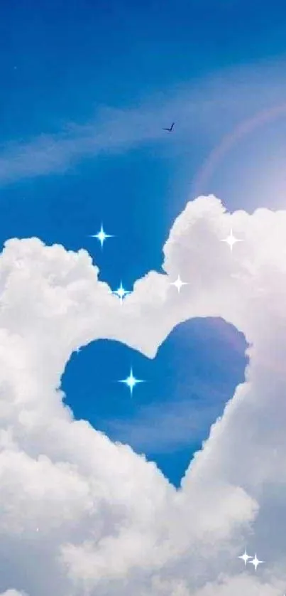 Heart-shaped cloud in blue sky wallpaper with white fluffy clouds.