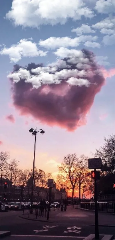 Heart-shaped cloud over urban sunset with purple sky.