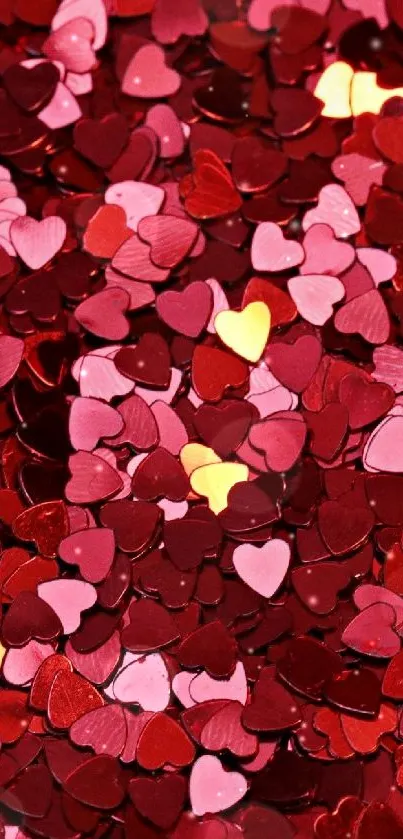 Red and pink heart-shaped confetti pattern wallpaper.