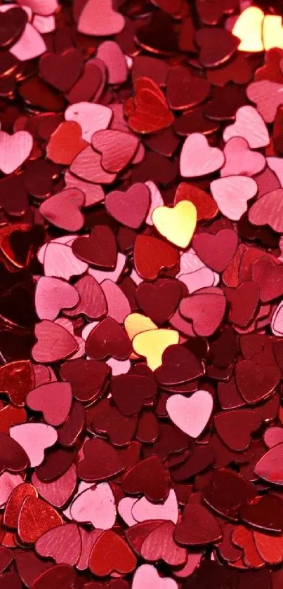 Heart confetti wallpaper with red, pink, and gold hues.