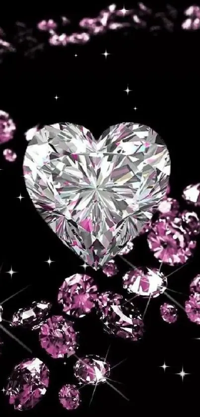 Heart-shaped diamond and pink gems on a black background wallpaper.