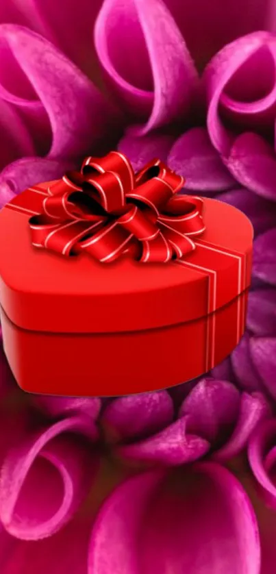 Red heart-shaped gift box on a purple dahlia flower background.