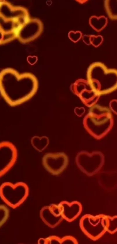 Glowing red and yellow heart shapes on a burgundy background.