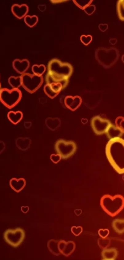 Heart glow wallpaper with red and orange hues for mobile.