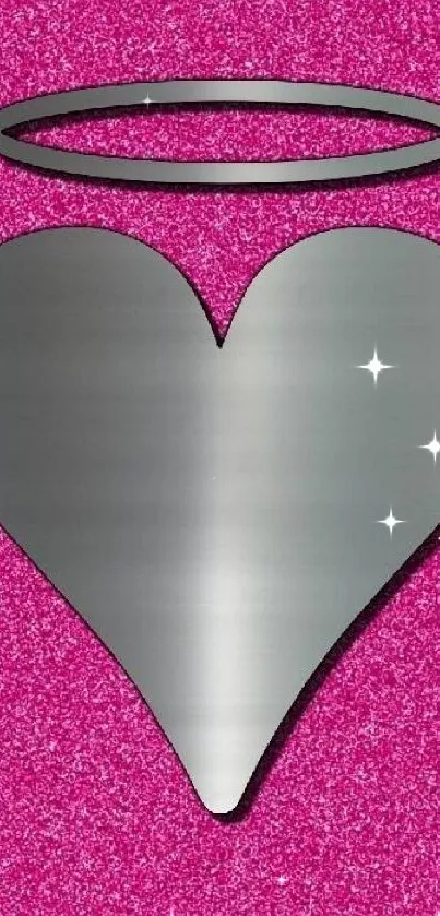 Metallic heart and halo on pink glitter background.