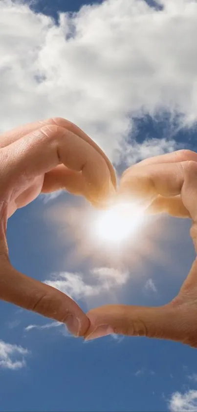 Hands forming heart with sky and sunlight background.