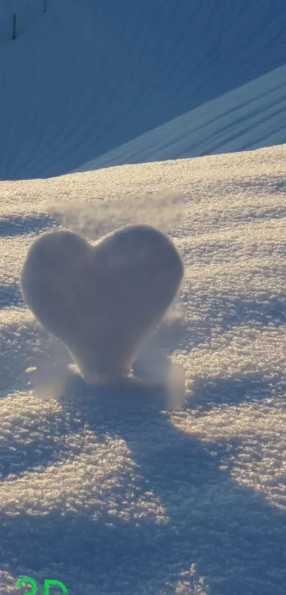 Heart-shaped snow illuminated by sunrise on a snowy field.