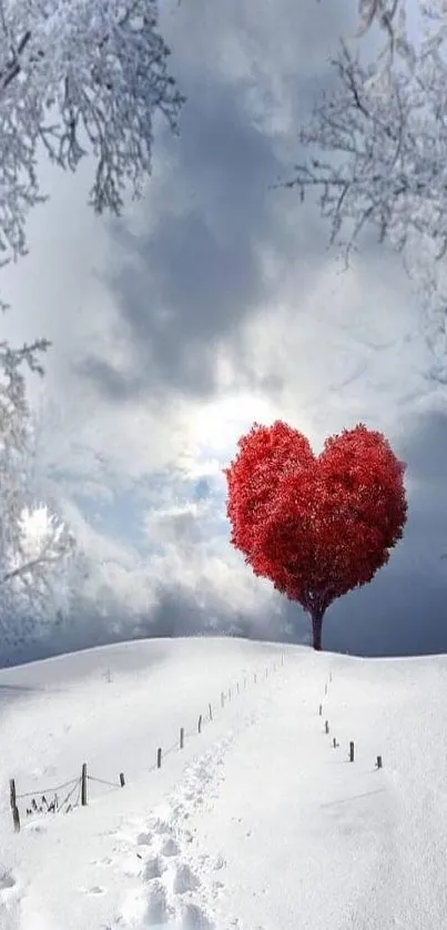 Heart-shaped red tree in snowy winter landscape wallpaper.