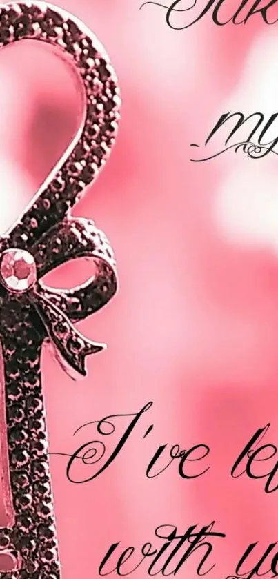 Heart-shaped key on pink background with romantic text.