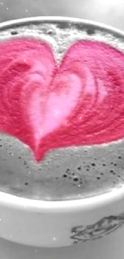 Pink heart latte art on coffee cup wallpaper.