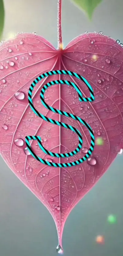 Pink heart-shaped leaf with monogram 'S'.