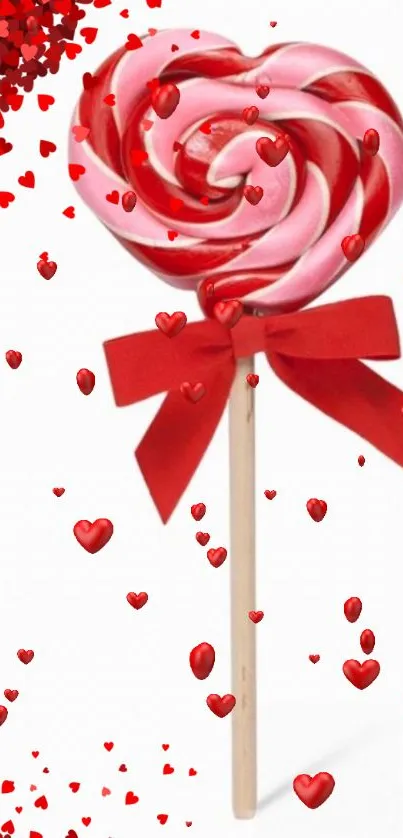 Heart-shaped lollipop with red hearts design.