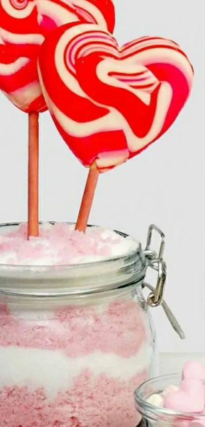 Two heart-shaped candies in a jar.