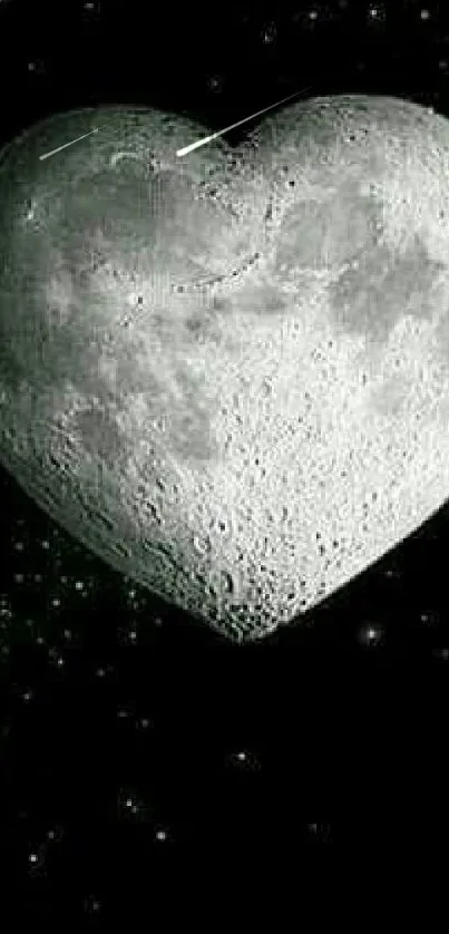 Heart-shaped moon with stars on a dark night sky.