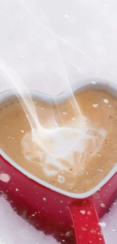 Heart-shaped mug with steaming coffee on snowy background.