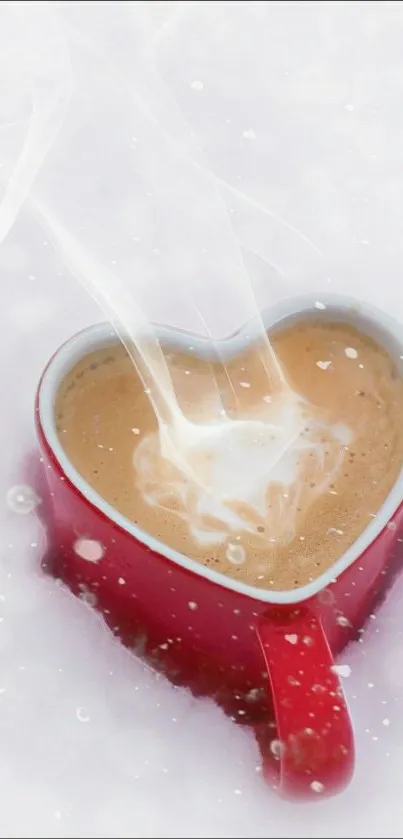 Heart-shaped coffee mug in snow with steam rising.