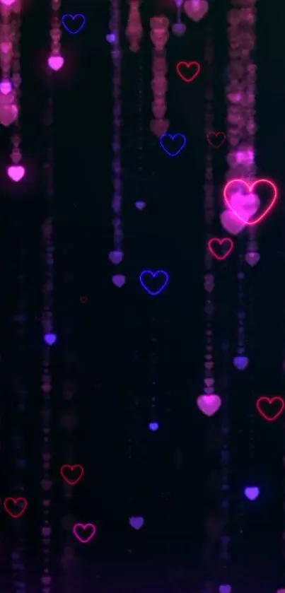 Neon hearts wallpaper with glowing pink and blue lights on a black background.