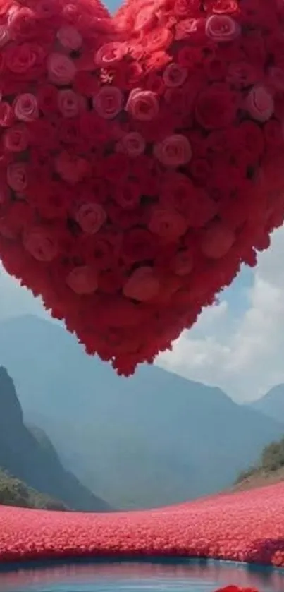 Heart-shaped rose arrangement with mountains in the background.