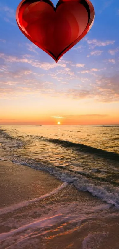 Red heart over a serene ocean sunset with colorful sky hues.