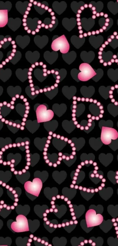 Pink hearts pattern on black wallpaper.