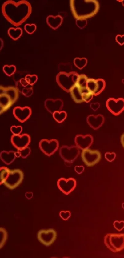 Red and yellow glowing heart pattern wallpaper for mobile.